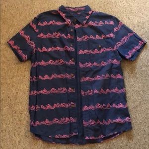 Casual button down tropical print shirt.